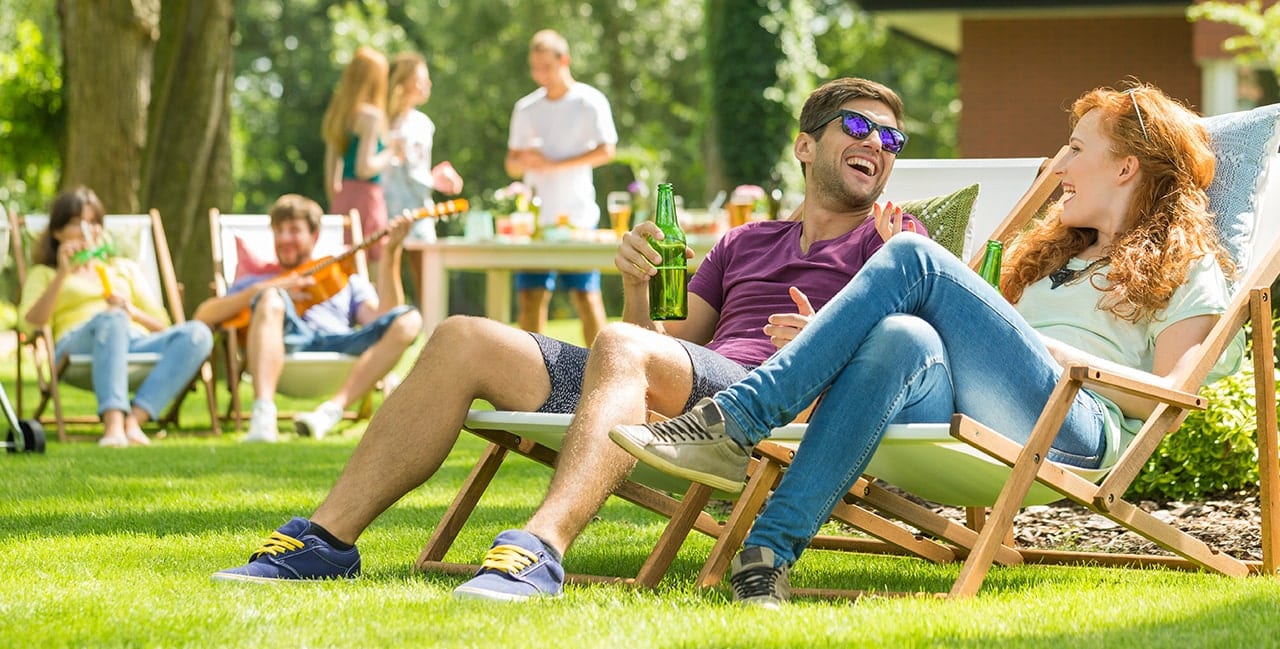 Couples sitting in lawn chairs and enjoying the outdoors at Wildcat Ranch