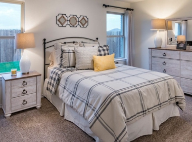 Bed and dresser in Master Bedroom at Wildcat Ranch, new master-planned community