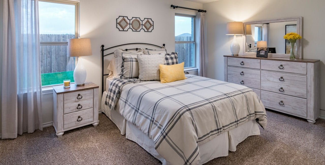 Bed and dresser in Master Bedroom at Wildcat Ranch, new master-planned community