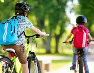 Children on bikes riding to Crandall Independent School District