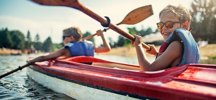 boy kayaking in texas